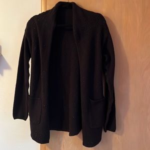 Maurice’s black cardigan